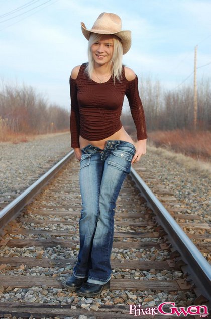 hot cowgirl chick0 I wouldn't mind tying her down to those rail road tracks