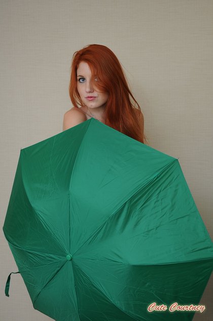 naked redhead with umbrella1