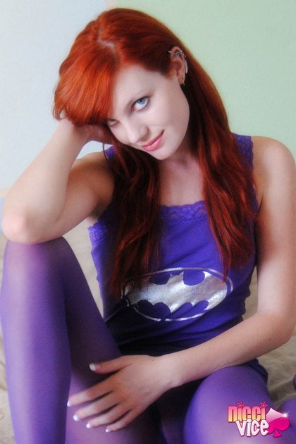 But it's kind of hot seeing a sexy teen red head wearing purple pantyhose